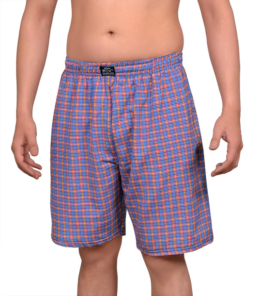 The image displays a pair of vibrant blue and orange check cotton shorts, designed with both style and comfort in mind. The shorts feature a prominent check pattern in shades of blue and orange, creating a fresh and eye-catching look.